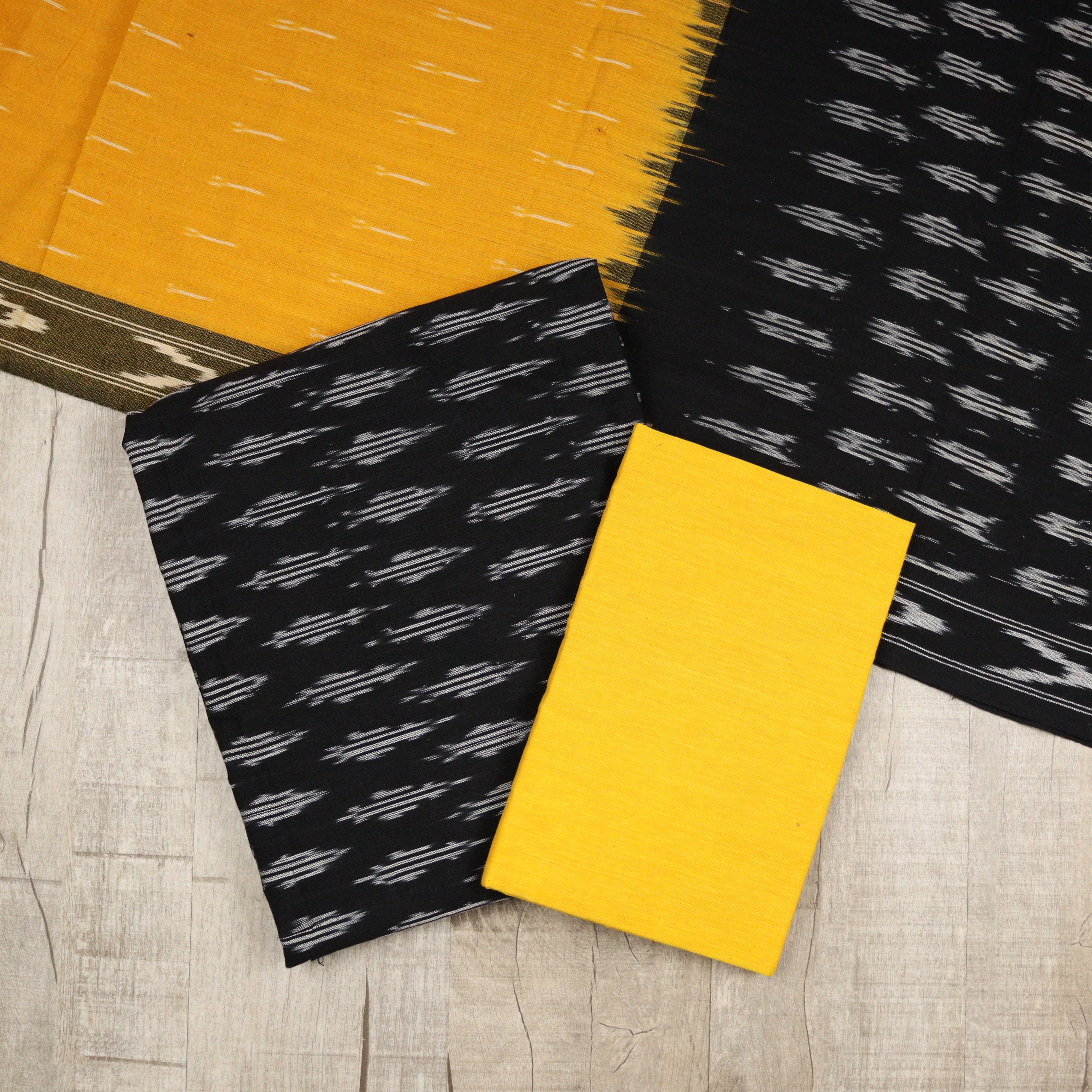Load image into Gallery viewer, Black And Mango Yellow Pure Cotton Ikat Unstitched Suit-3503
